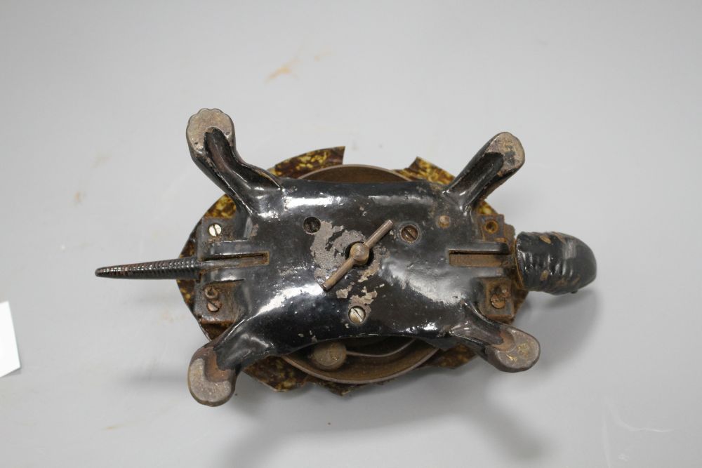 A Victorian cast iron and simulated tortoiseshell table bell, modelled as a tortoise, length 17cm